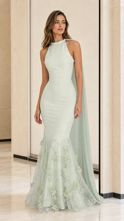 Front view of sage green halter mermaid evening dress with cape