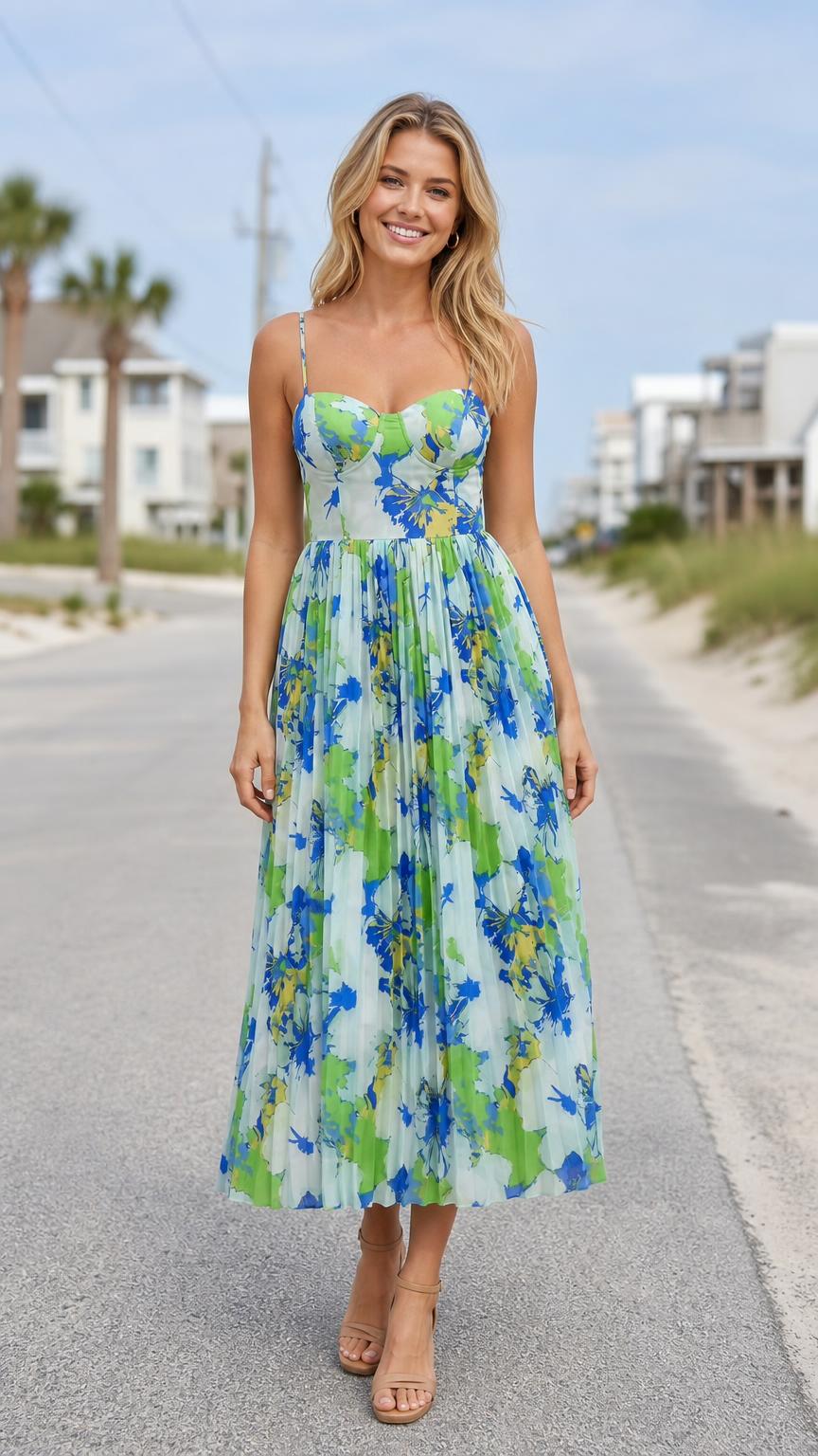 Front view of model wearing white and blue floral print midi dress