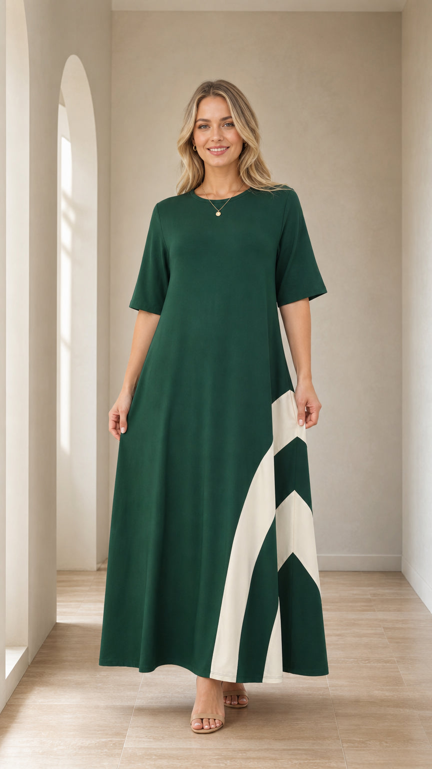 Front view of woman wearing Forest Green color-blocked maxi dress