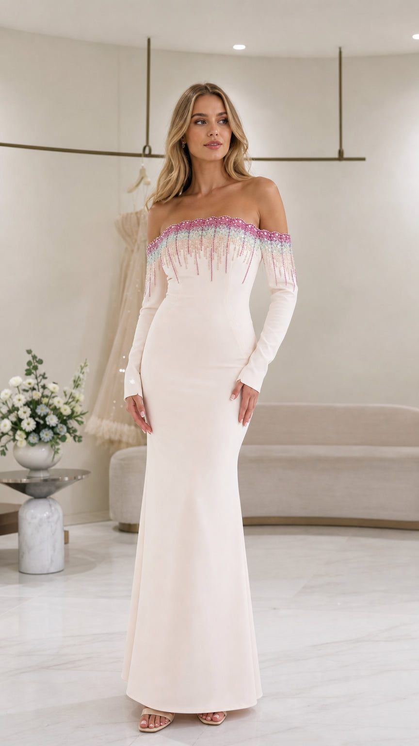 Ivory off-the-shoulder long sleeve maxi evening gown with beaded fringe detail - front view
