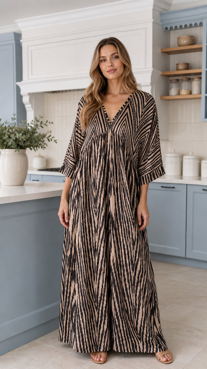Front full-length view of woman wearing Mocha Brown boho printed wide-leg maxi jumpsuit