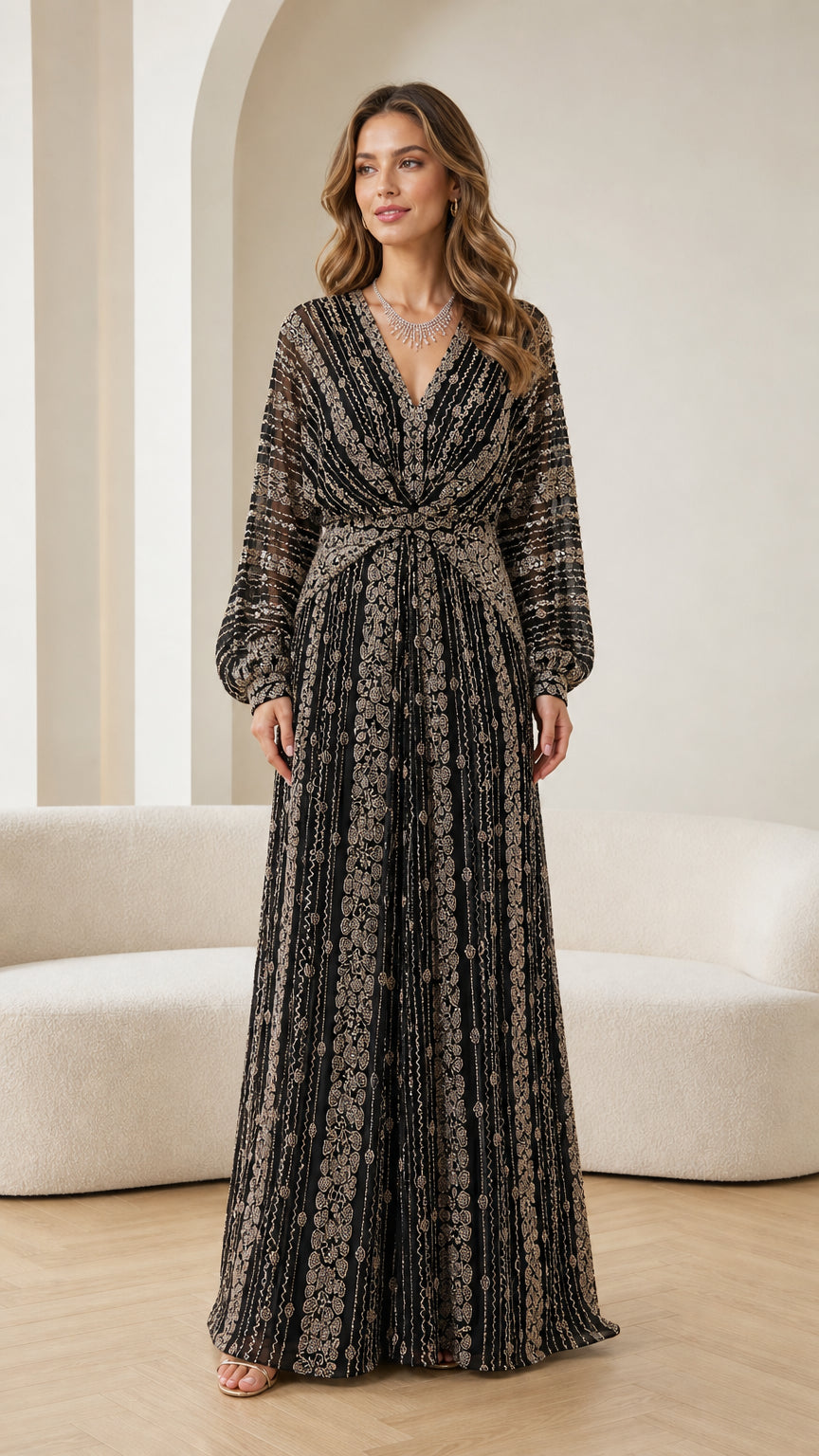 Front full-length view of woman wearing black beaded long sleeve maxi dress