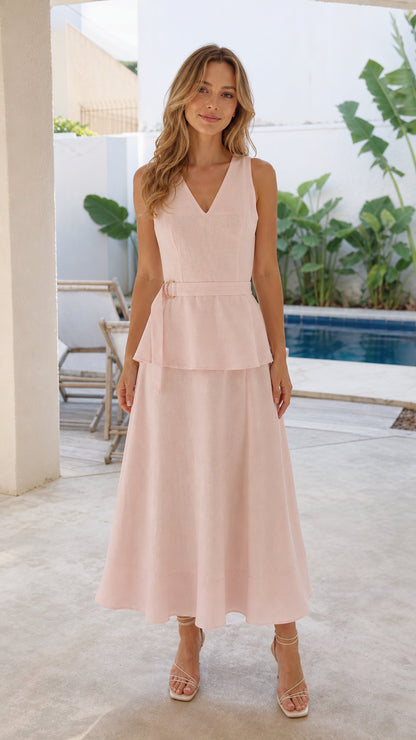 Woman wearing pink V-neck peplum midi dress from the front