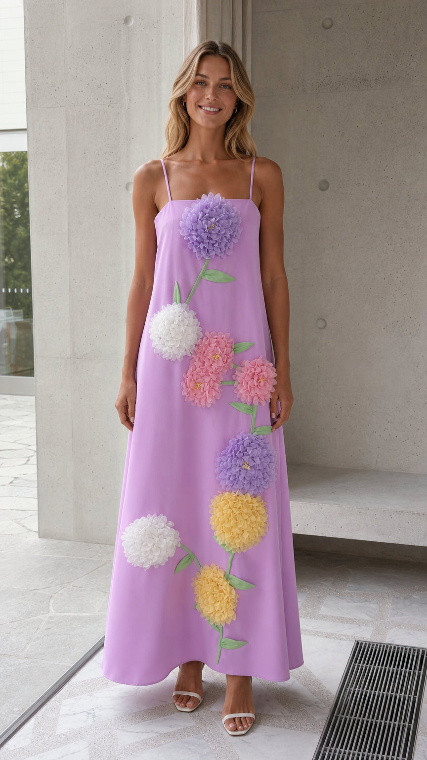 Front view of lavender spaghetti strap maxi dress with 3D floral appliqué