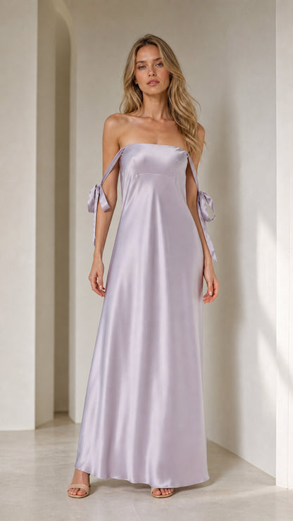 Model wearing lavender satin strapless maxi dress from front
