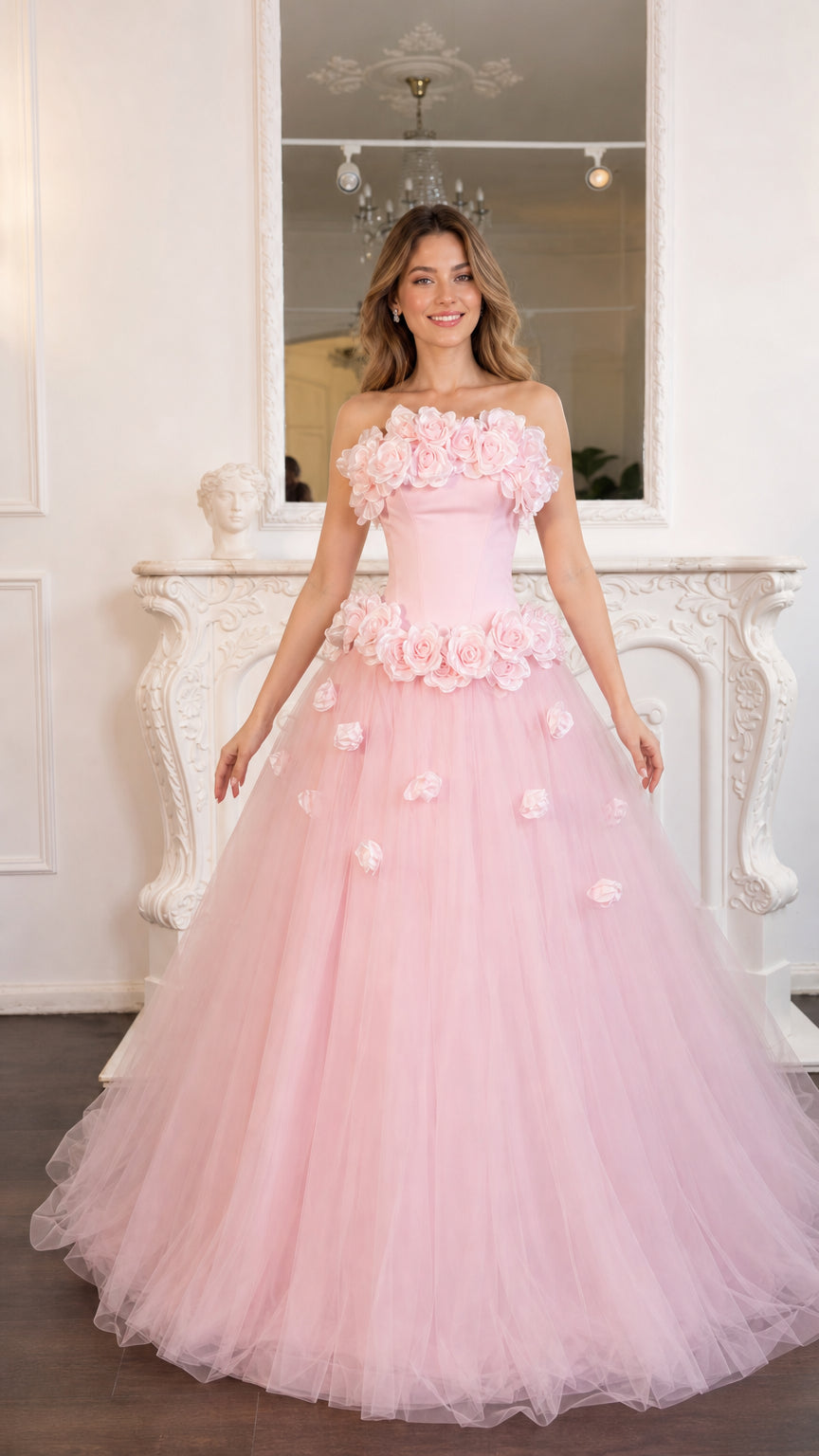 Front view of model wearing the pink 3D rose strapless tulle gown