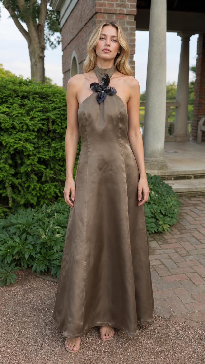 Full front view of model wearing taupe satin halter maxi dress