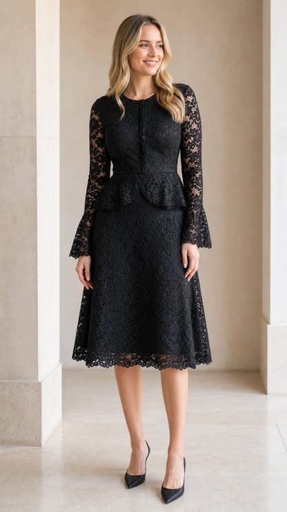 Front view of model wearing black floral lace peplum midi dress with long flared sleeves