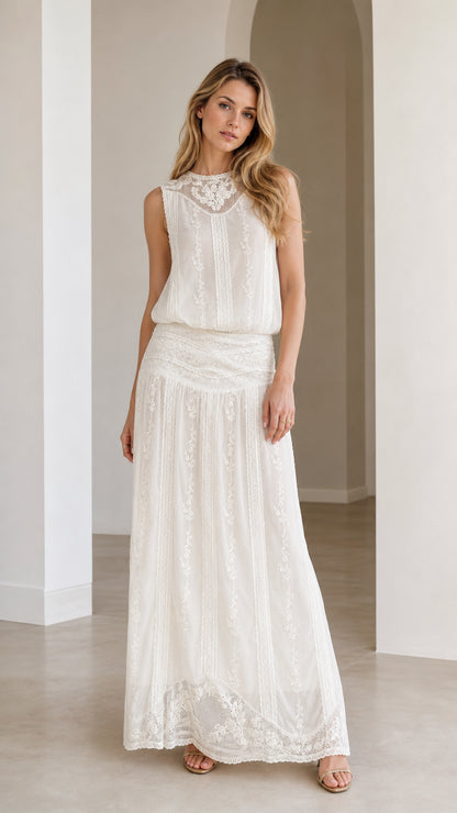 Front view of woman wearing white boho lace maxi dress
