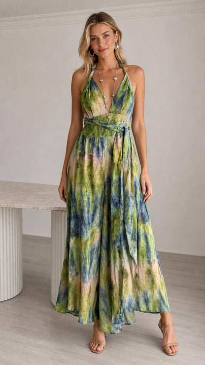 Model wearing green tie-dye halter neck maxi jumpsuit from the front