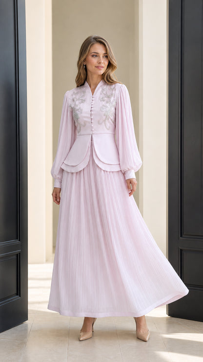 Front view of light pink beaded long sleeve maxi dress