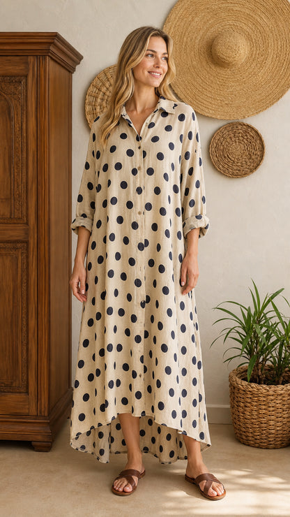 Front view of beige polka dot maxi shirt dress on model
