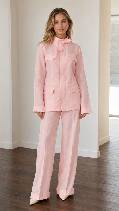 Front full-length view of woman wearing Light Pink utility pant suit set with tie neck