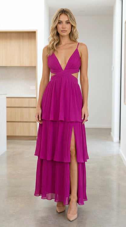 Front view of model wearing Fuchsia pleated tiered cutout maxi dress