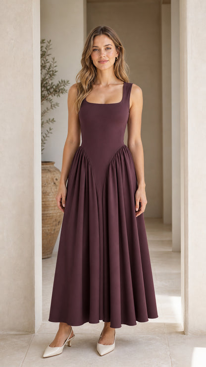 Front full view of woman wearing burgundy square neck maxi dress