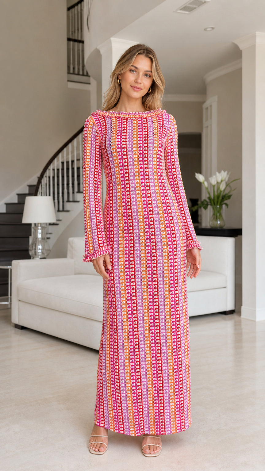 Front view of model wearing pink striped crochet maxi dress