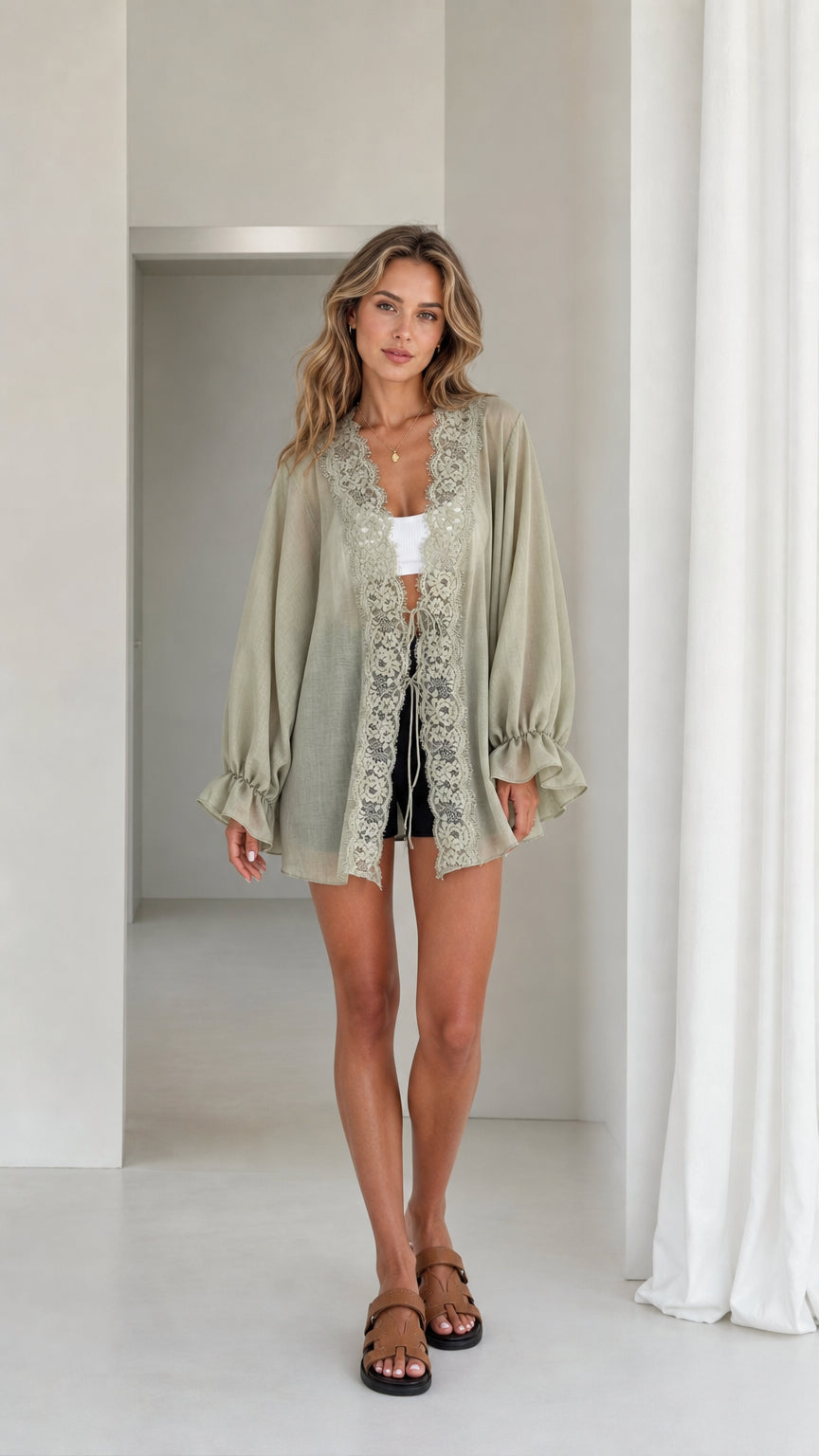 Model wearing sage green lace trim kimono cardigan front view
