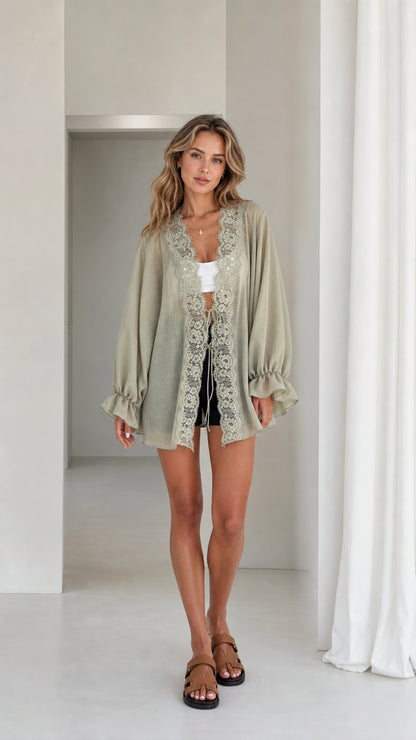 Model wearing sage green lace trim kimono cardigan front view