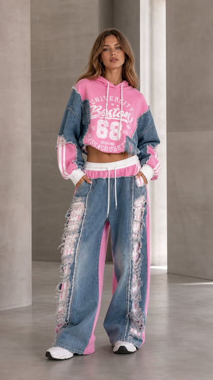 Front full view of pink denim patchwork cropped hoodie and wide leg sweatpants set