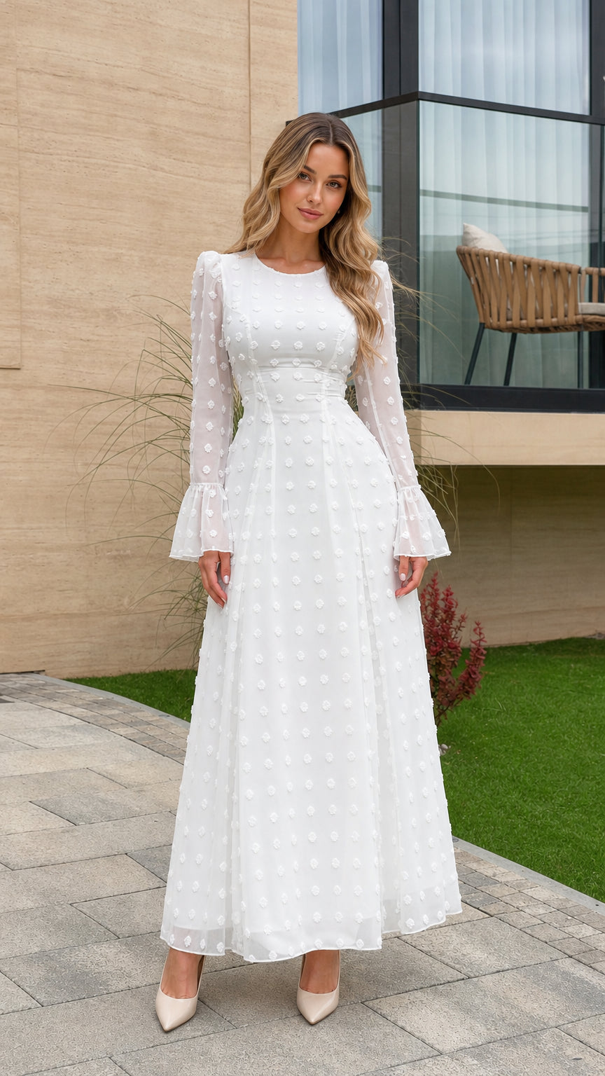 Full front view of model wearing white Swiss dot bell sleeve maxi dress