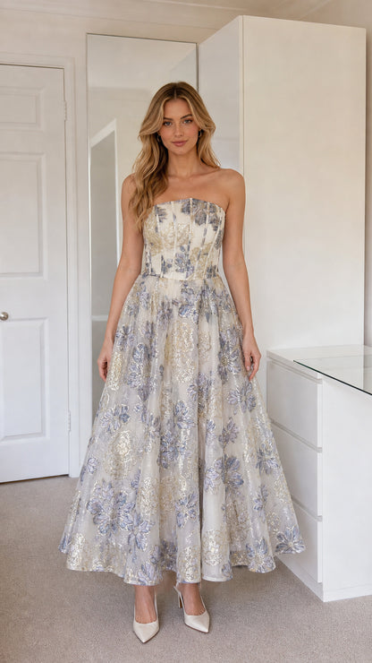 Full front view of model wearing champagne metallic floral jacquard strapless midi dress