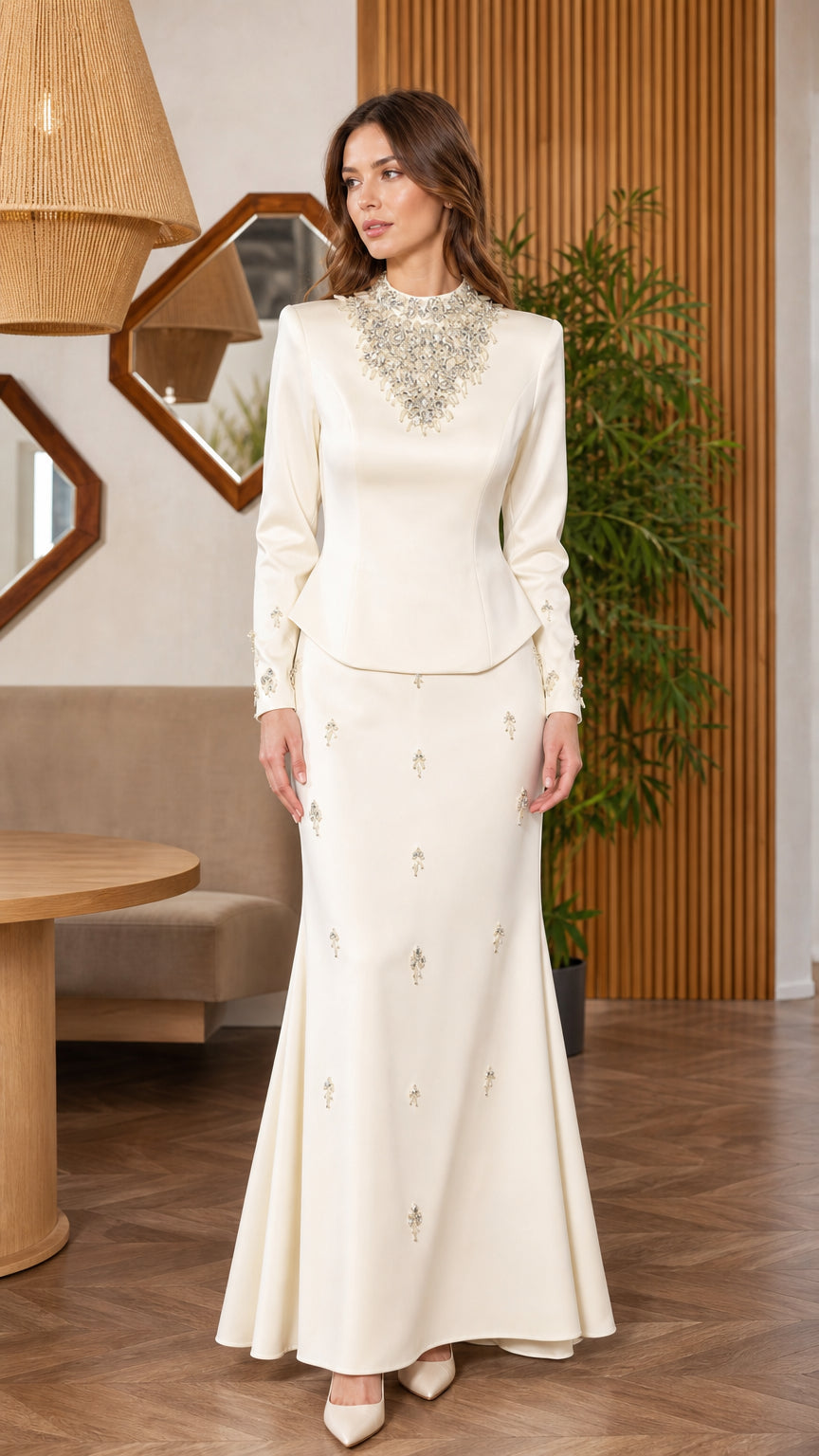 Ivory two-piece evening set with pearl embellished neckline and peplum top front view