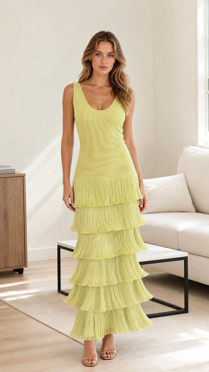 Front view of model wearing lime green sleeveless tiered fringe maxi dress