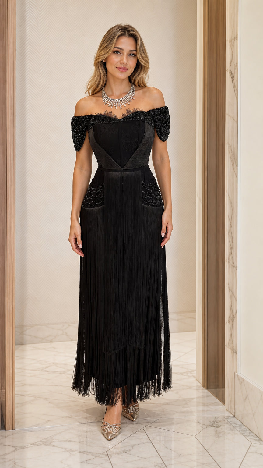Front view of black off-the-shoulder beaded lace fringe evening maxi dress