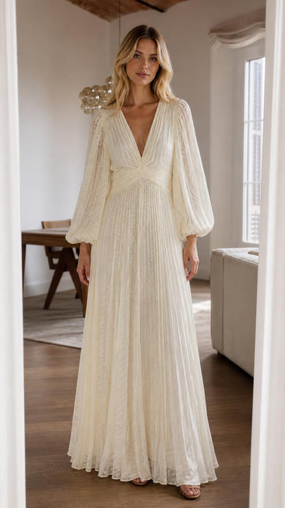 Front view of cream pleated long sleeve maxi dress