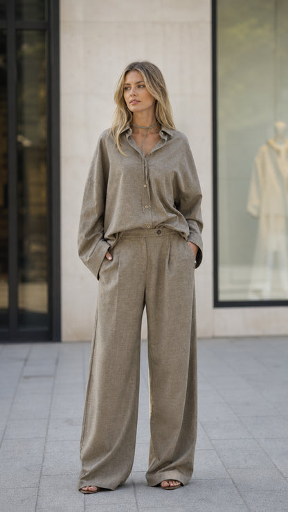 Front view of woman wearing taupe linen-blend shirt and wide-leg pants set