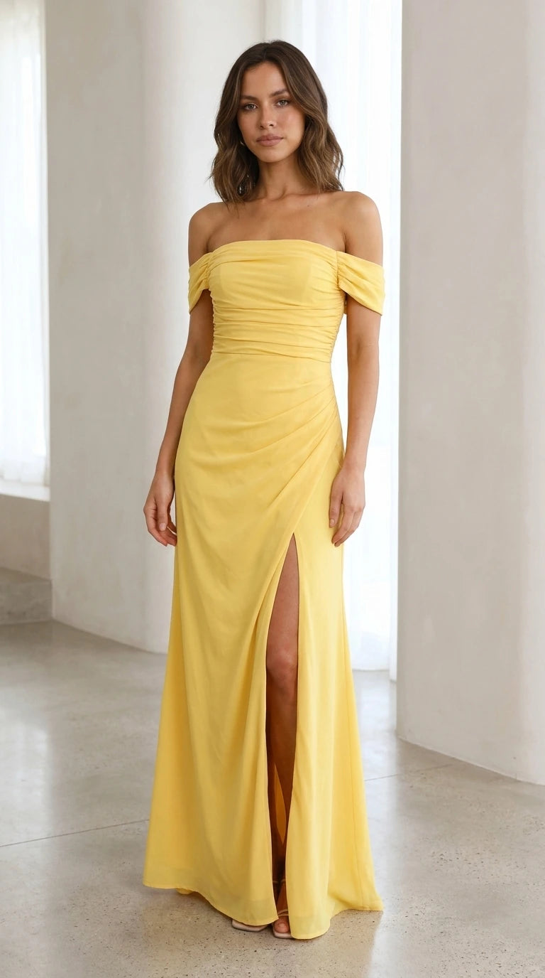 Front view of yellow off-the-shoulder ruched maxi dress with slit