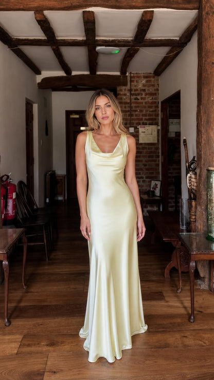 Front view of yellow satin cowl neck maxi dress