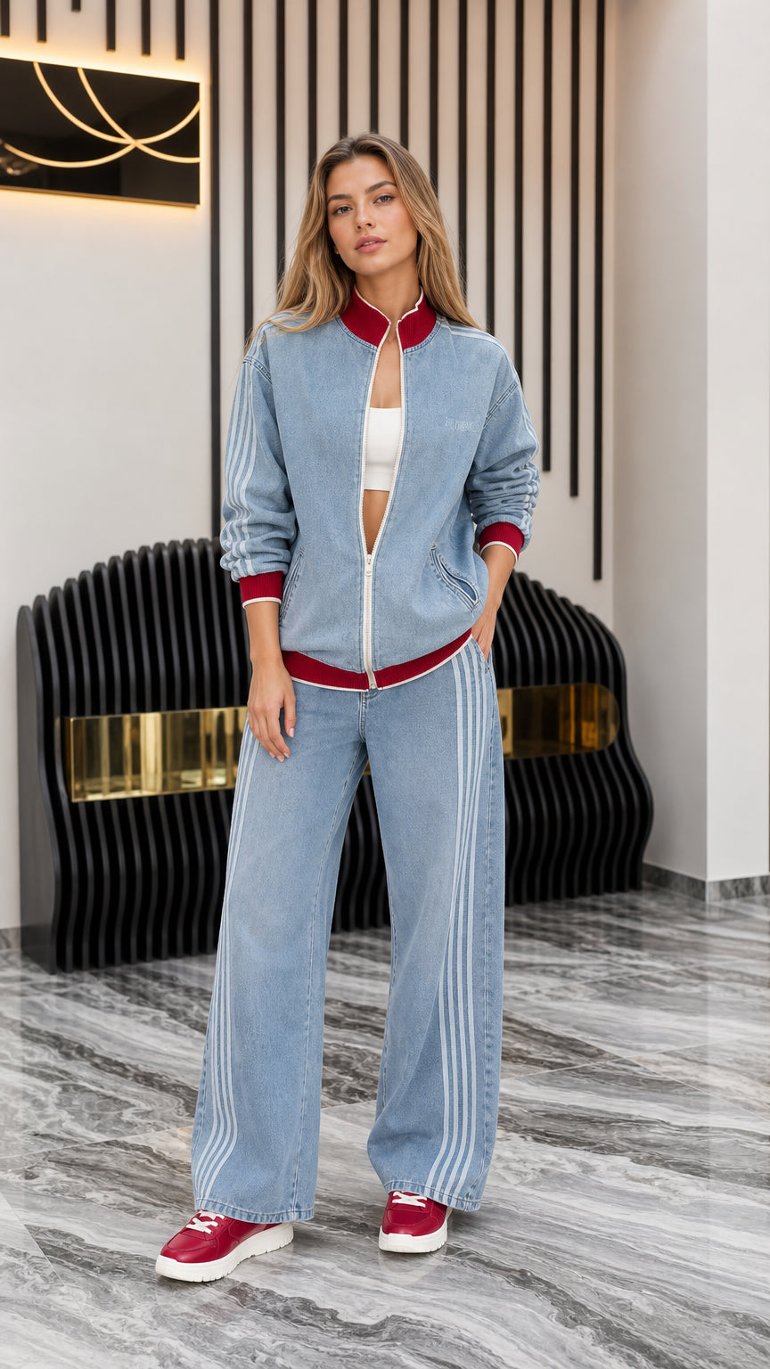 Front view of model wearing Light Blue denim track jacket and wide-leg pants set