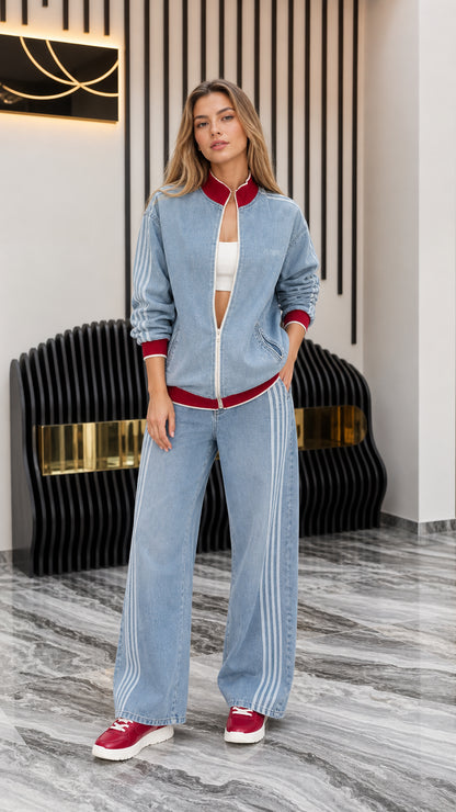 Front view of model wearing Light Blue denim track jacket and wide-leg pants set