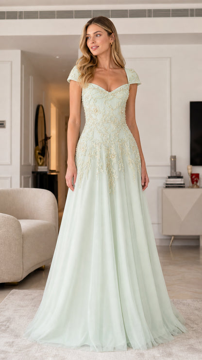 Front view of sage green embroidered tulle evening gown