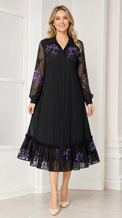 Front view of woman wearing black floral embroidered midi dress