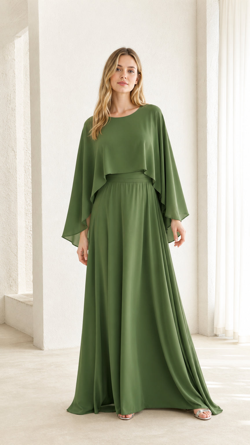Front view of woman wearing olive green cape overlay maxi dress