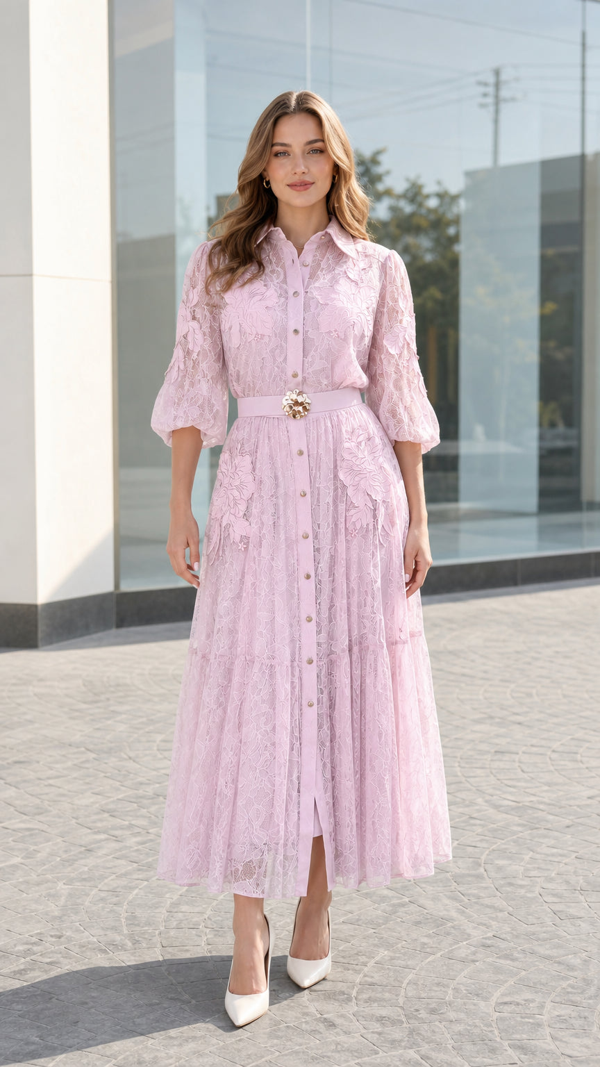 Front full view of woman wearing blush pink floral lace button-down midi dress with belt