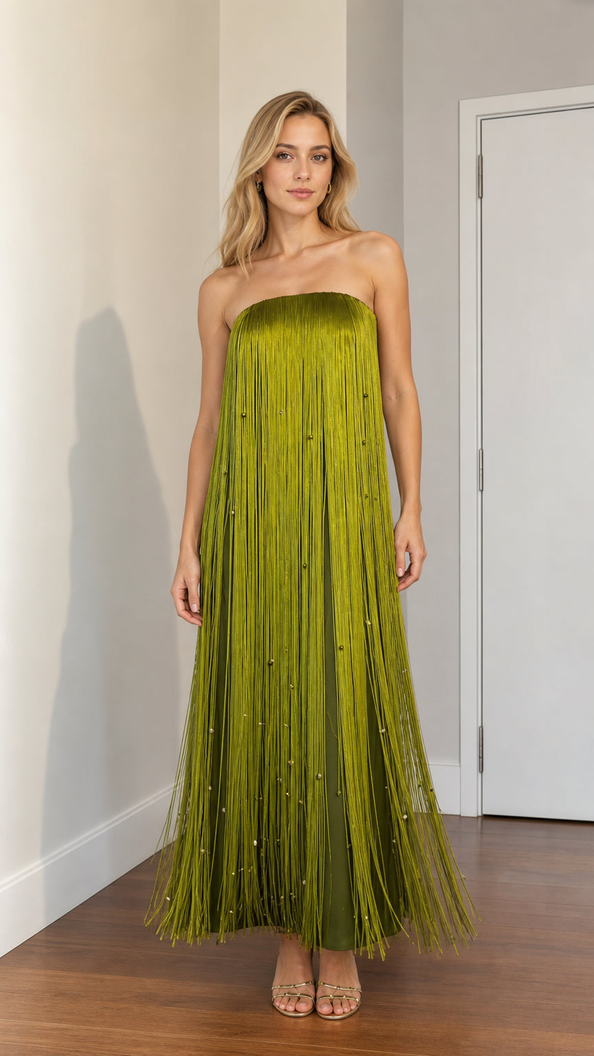 Front view of woman wearing olive green strapless beaded fringe maxi dress