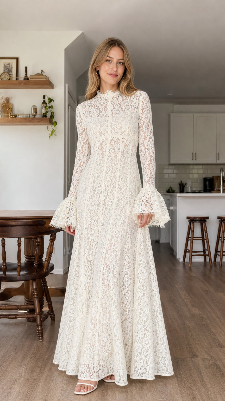 Model wearing white all-over lace long sleeve maxi dress from the front