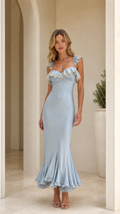 Model wearing light blue ruffle trim maxi dress front view