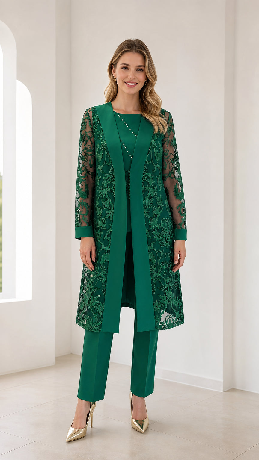 Model wearing green 3-piece lace duster jacket and pants set, front view