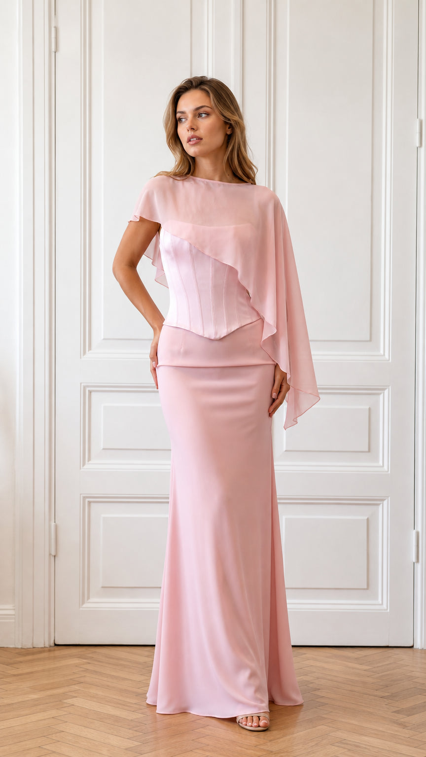 Front view of model wearing pink cape evening dress