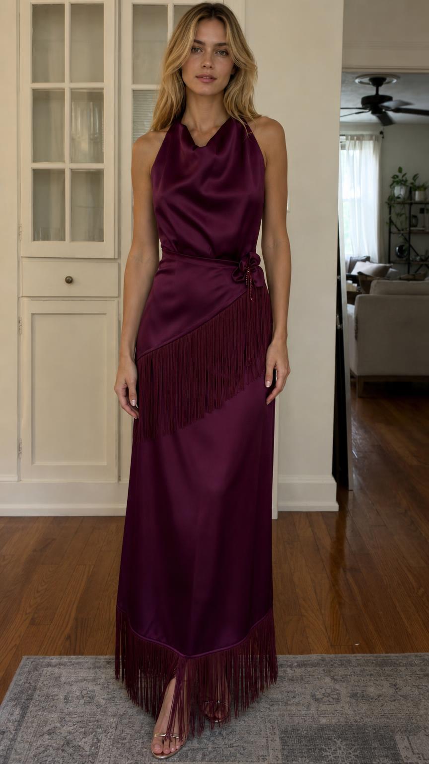 Front view of burgundy satin halter maxi dress with fringe hem