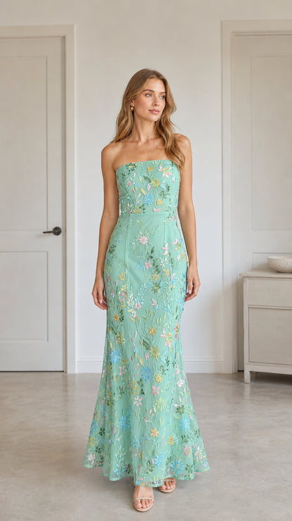 Front view of mint green floral embroidered strapless maxi dress