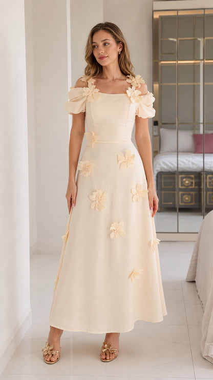 Front full view of cream floral applique cold shoulder midi dress