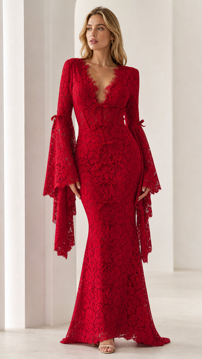 Front view of model wearing red lace maxi dress with flared sleeves