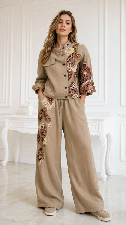 Front view of model wearing khaki embroidered beaded jacket and wide-leg pant set