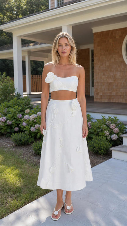 Front view of woman wearing white floral applique two-piece set