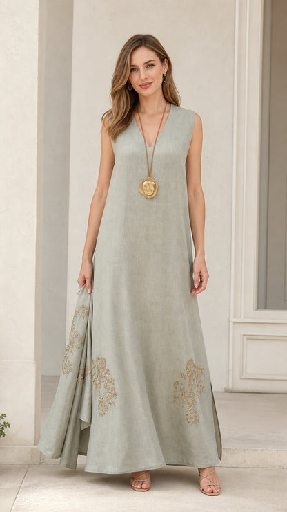 Front view of model wearing sage green sleeveless maxi dress